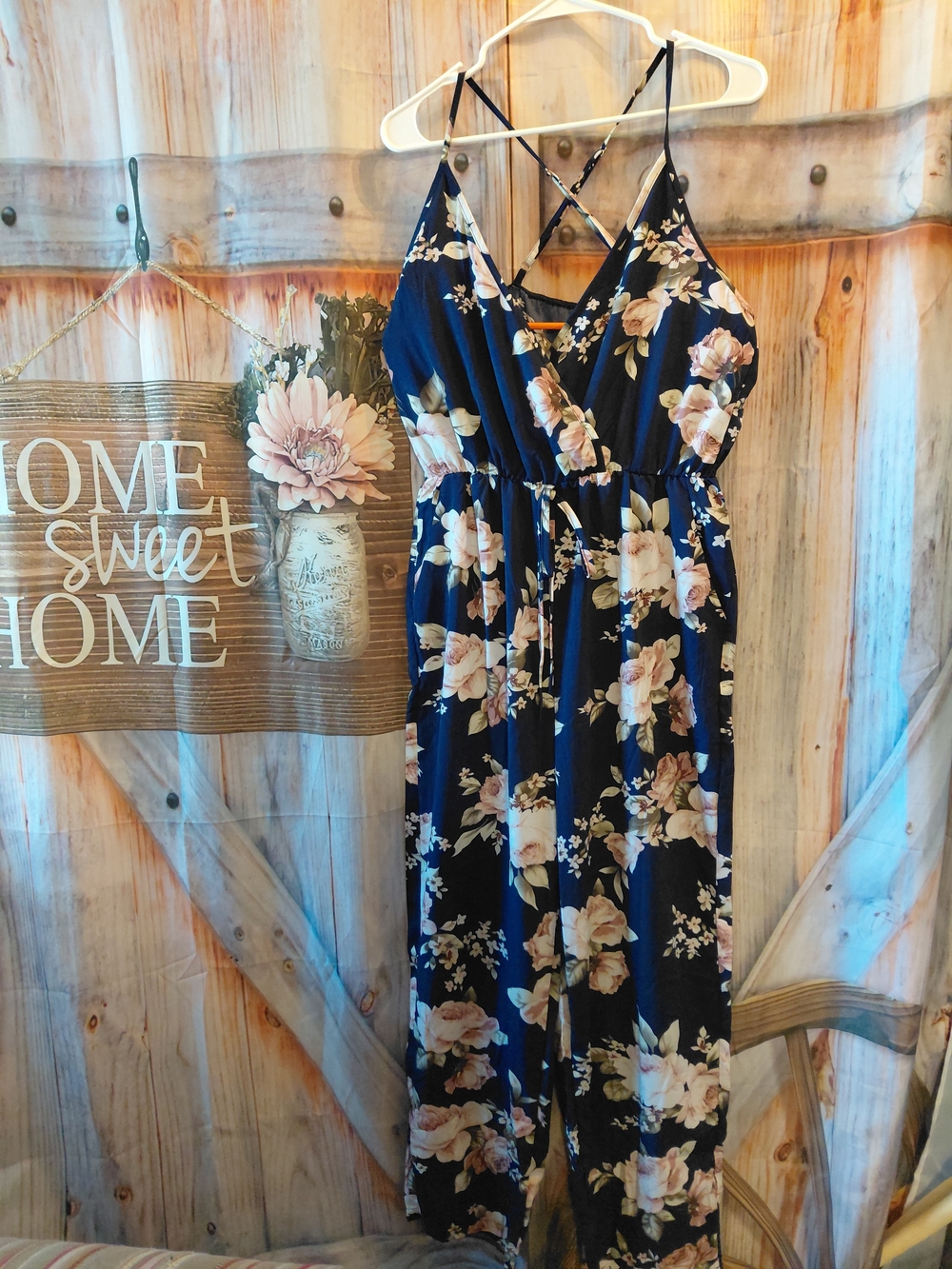 Amazon Navy Floral Sleeveless Jumpsuit with Crisscross Straps